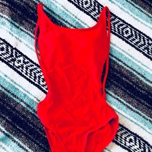 Sexy open back red one piece.
